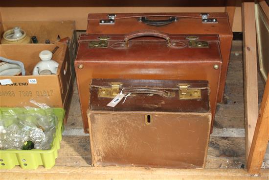 3 leather suitcases